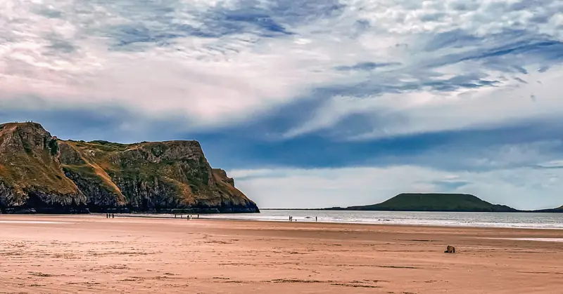 Low tide, Worm's Head on the horizon
