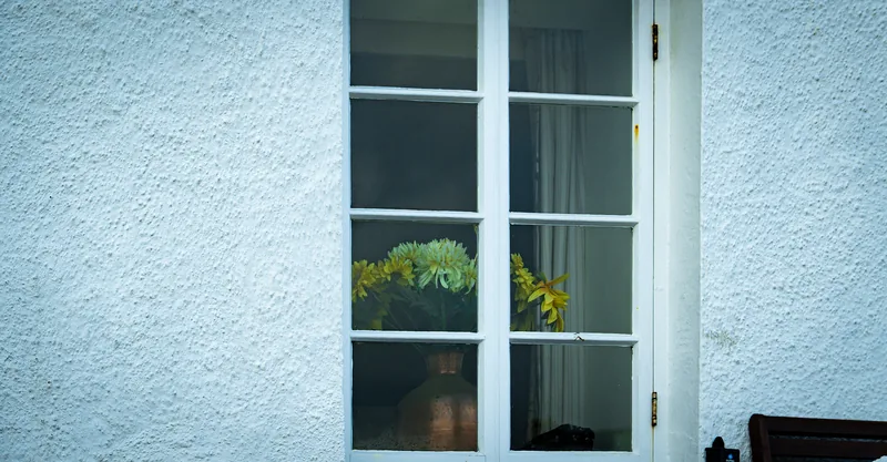 Window, white wall