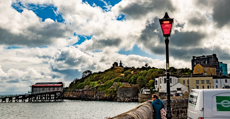 Red lamp on the harbour wall